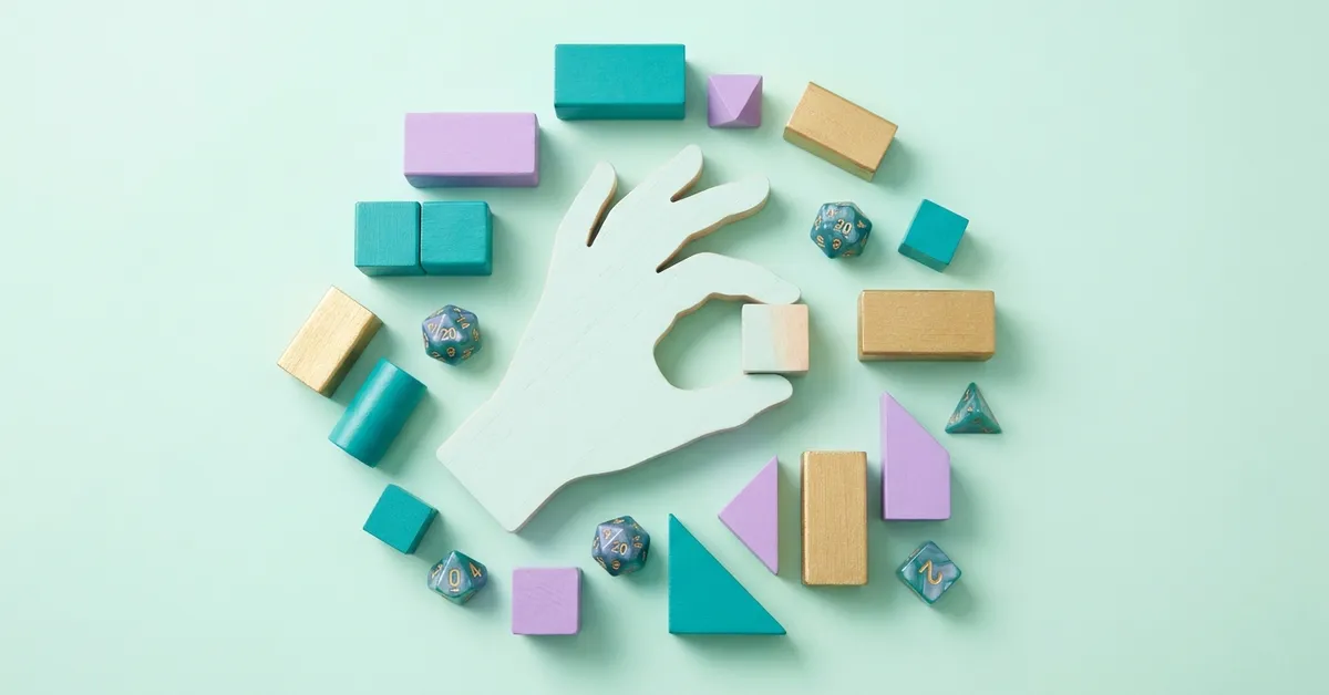 Kinesthetic learning style symbolized by a wooden hand cutout surrounded by blocks and dice.