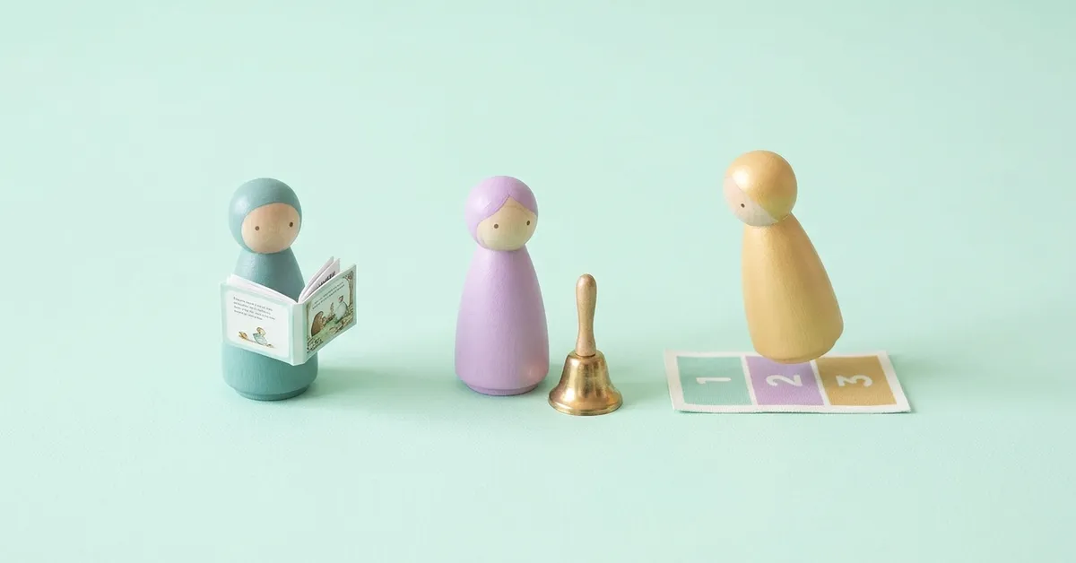 Learning styles compared with peg dolls: one reading, one listening by a bell, one jumping on a number mat.