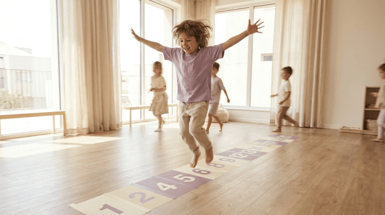 Child hopping along a number line, learning math through movement